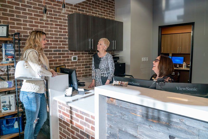 patient at front desk patient at front desk